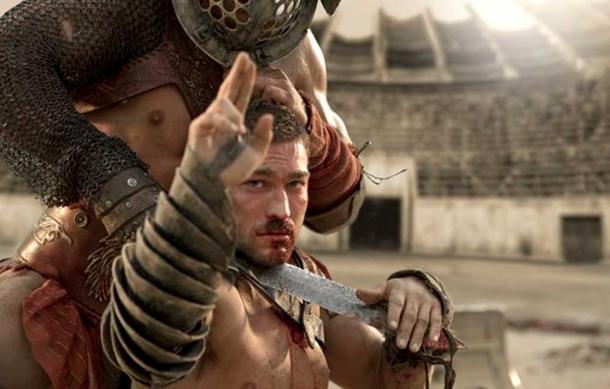 Spartacus performing a “Two-fingered salute.”