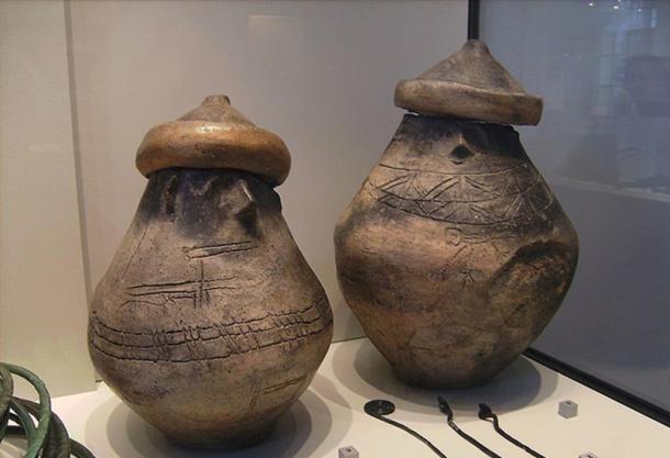 Two urns with facial decoration in Museum für Vor- und Frühgeschichte, Berlin.