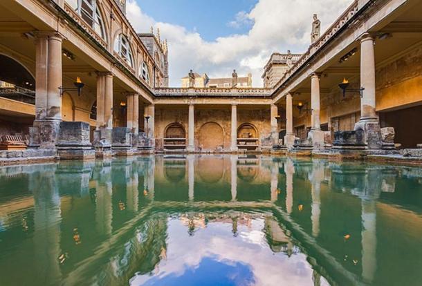 View of the Great Bath, part of the Roman Baths complex, a site of historical interest in the city of Bath, England. The baths, based on the local hot springs, were built during the Roman occupation of Britain and have become a major touristic site. (Diego Delso/CC BY SA 4.0)