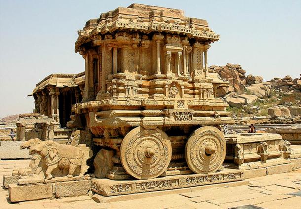In front of the Vittala Temple of Hampi, India is the world famous stone chariot or ratha. This is one of three impressive stone chariots in India, the other two found in Konark and Mahabalipuram. The wheels of the ratha could originally be rotated, but they were fixed in place by the government to avoid future damage by visitors.
