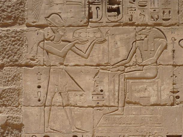 Wall relief of Amun receiving gifts from Ramses III, mortuary temple of Ramses III, Medinet Habu, Theban Necropolis, Egypt, 2009 Phot by Remih
