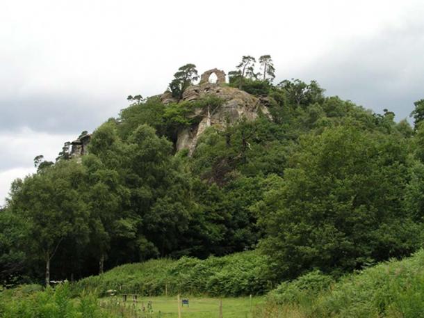 The White Cliff at Hawkstone Park. The cave containing the statues is just below the ruined arch.