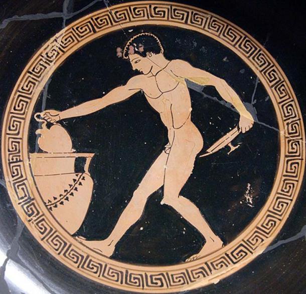 Wine boy at a Greek symposium. He uses an oinochoe (wine jug, in his right hand) to draw wine from a crater, in order to fill a kylix (shallow cup, in his left hand). Tondo of an Attic red-figure cup, ca. 490-480 BC.