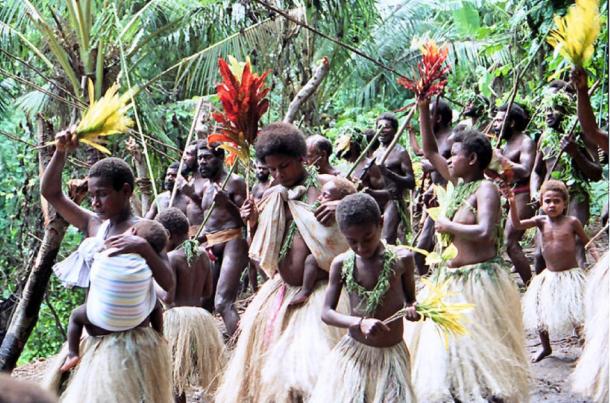 Women and children dancing and singing at a land diving ceremony on the Pentecost Island, Vanuatu. (Paul Stein / CC BY-SA 2.0)
