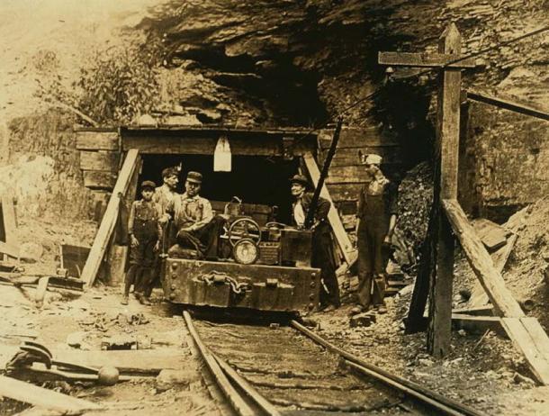 Workers at the entrance to a W. Va. coal mine: a 