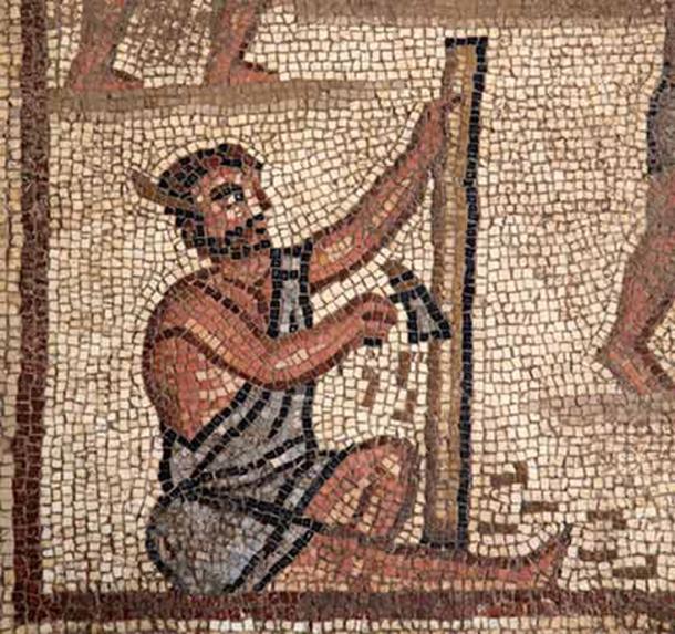 Workman chiseling wood in the Tower of Babel panel found in 2017. (Israel Antiquities Authority)
