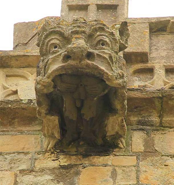 The X-rated male figure in the mouth of a gargoyle at the 12th-century St Michael the Archangel's Church in Laxton, Nottinghamshire, which according to Sheelangig.org combines “the exhibitionist motif with the devoured sinner.” (htcRichardCroft)