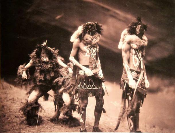Navajo Yebichai dancers by Edward S. Curtis, 1900, signifying the arrival of the Navajo fourth world and human beings. (Edward S. Curtis / Public domain)