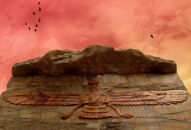 Beautiful photograph of Zoroastrian symbolic carving, viewed under a stunning red sky, Farvahar. Persepolis, Iran. 