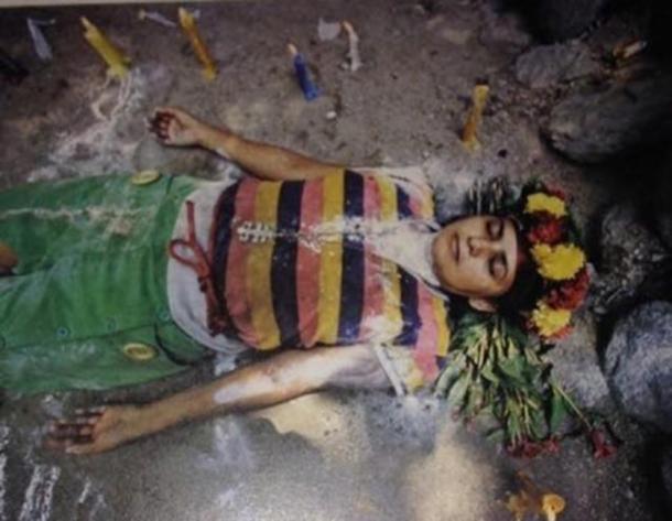 A person taking part in one of the Maria Lionza ceremonies. (Altar de la Reina Maria Lionza)