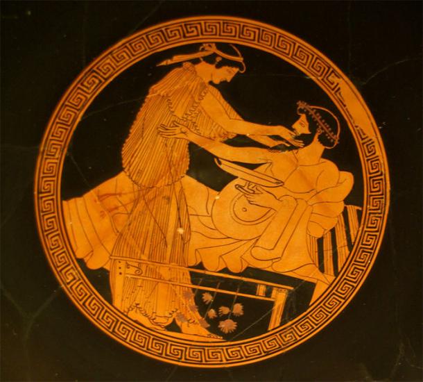 A scene from the interior bowl of a red-figure kylix or stemmed drinking cup (490-480 BC) depicting a Greek man and a hetairai (high-class prostitute). (Sebastià Giralt / CC BY-NC-SA)