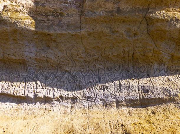 “The abstract petroglyphs carved on the cliff walls are distinctly different from other types of rock art found throughout California. They are said to 'tell a story' but the precise details are not publicly known.”