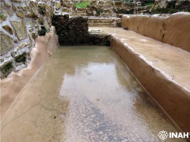 According to INAH archaeologist Arnoldo González, this newly-revealed Palenque pond, where the young corn god’s severed head was found, was used as a mirror to reflect the Maya cosmos in nocturnal rituals. (INAH)