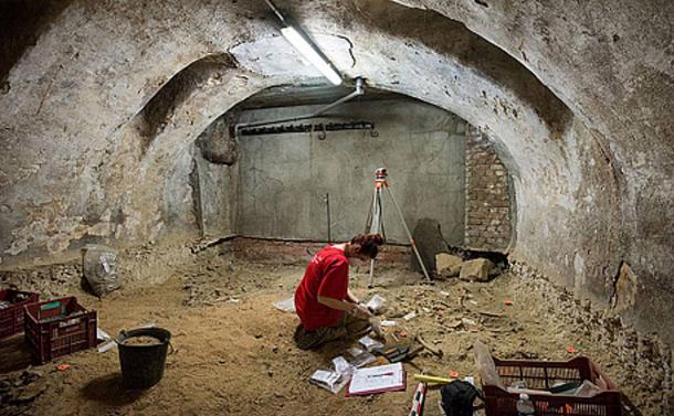 An archaeologist works at the site