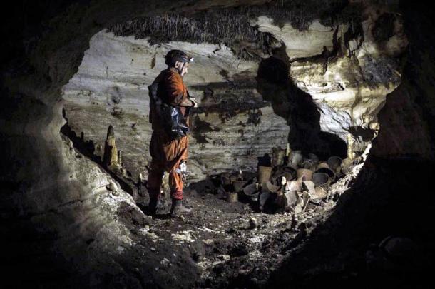 The archaeologist Guillermo de Anda next to the artifacts found in the Balamkú cave at the Maya ruins of Chichén Itzá. (Karla Ortega / GAM)