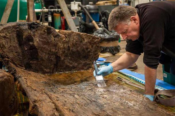 An up-close look at the Tetney Bronze Age coffin during restoration work. (Charlotte Graham / York Archaeological Trust)