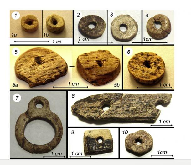 A selection of beads and carved mammoth ivory pieces found at the site in Siberia. (Archaeological Research in Asia)