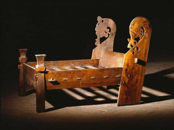 Copy of the bed found in the Oseberg ship burial chamber where two elderly women were found lying next to each other.