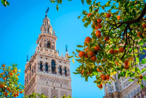 The bell tower of the Cathedral in Seville is known as La Giralda, built as the minaret for the Great Mosque of Seville during the reign of the Almohad Dynasty in the 9th century. After the reconquest the mosque was symbolically converted into a Cathedral. (Aranami / Adobe Stock)