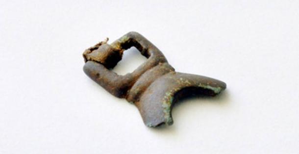 One of the bronze artifacts recovered from the 1,000-year-old Alaska house. 