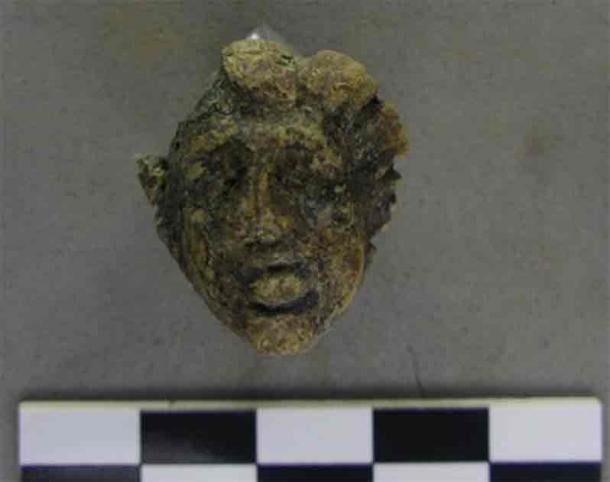 Bronze head found among the Roman ruins at Chamboret linked to the late occupation of the site. (Inrap)