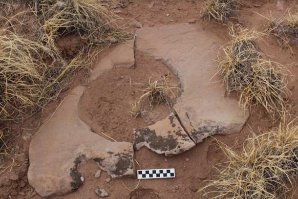 A carved stone collar marking an underground storage pit dating to the period prior to climate catastrophe extreme cooling. Note the engraved zig-zagging line signifying migration and movement in the top right-hand corner. (R. J. Sinensky / Antiquity Publications Ltd)