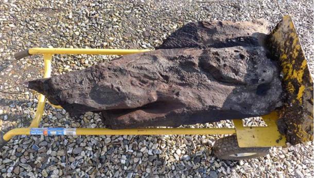 The carved wood dates to the Late Mesolithic period (4640 BC to 4605 BC) making it the oldest wooden artifact found in England. (© Derek Fawcett/Historic England)