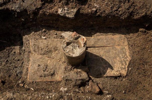 A ceramic libation conduit which allowed for offerings to be made directly into the grave