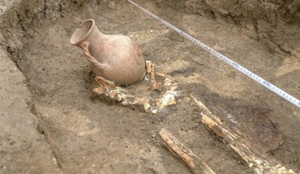 Two well preserved clay jars were place at the head and feet of the man. (Russian Highways)