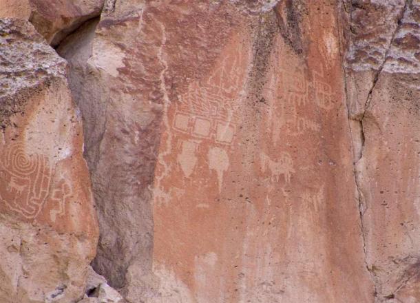 Located high up on a cliff face, the three squares in the center of the image have been interpreted as the three worlds of Fremont cosmology (underworld, material world, and upper world); Fremont Indian State Park. (Photo © John Lundwall)