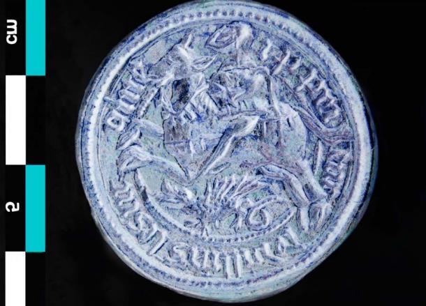 A closeup of the “positive side” of the St George seal in which you can easily see George the knight and his steed above the dragon. (© Serge le Maho / Inrap)