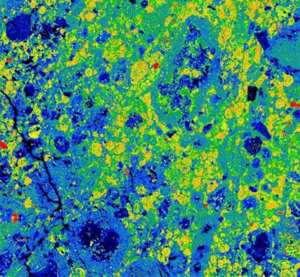 This colorful image is a composite element map showing the distribution of different minerals on a microscopic scale in a fragment of the Aguas Zarcas meteorite.  Orange-yellow colors show the distribution of a mineral called tochilinite, dark blue colors represent olivine, and red colors are pentlandite and pyrrhotite.  (Laurence Garvie / Center for Meteorite Studies, Arizona State University)