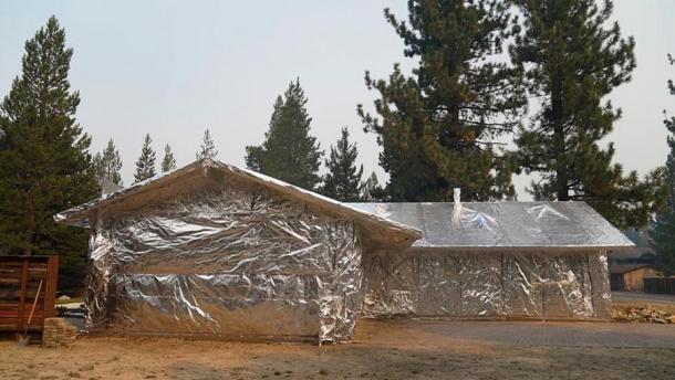 Some residents completely wrapped their homes in fire-resistant material. (WSAV.com)