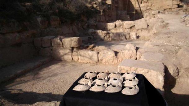 The courtyard with some of the many lamps that have been found. (IAA)