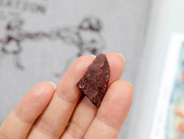 The crayon was used to make reddish brown marks.