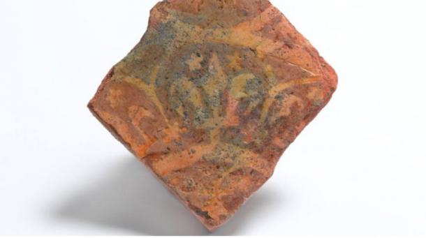 A decorated floor tile with stars and a fleur-de-lis from 1350 to 1390 A.D., made at Penn in Buckinghamshire, found at Farringdon