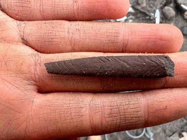 A decorated antler point found at the hunter-gather site in Scarborough. (University of Chester)