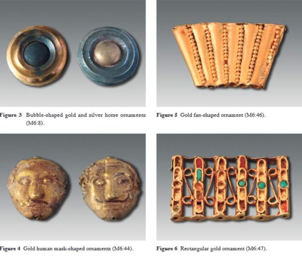 Some of the decorative items found in the largest tomb include these items as described in the journal Chinese Archaeology.