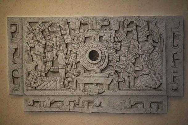 An old drawing of the same bas-relief from which all the elements of the mythical composition can be fully appreciated. Two sets of figures stand on the opposite sides of a rotating device, around which coil two entwined serpents. The central pole symbolized the world axis, supported by the turtle – symbol of the earth and perhaps of the constellation of Orion. The stormy sea is depicted in the lower left and right corners, with the mouths of sea monsters jutting out of it. Two figures stand on the opposite ends of the bas-relief carrying curious handbags believed to contain the nectar of immortality. (Courtesy INAH – Museo del Sitio El Tajin)