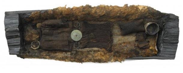 The coffin and remains of the Bronze Age Egtved Girl.