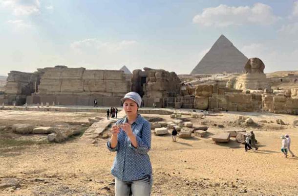 Eman Ghoneim studies the surface topography of the section of the ancient Ahramat Branch located in front of the Pyramids of Giza and the Great Sphinx. (Eman Ghoneim/Nature)