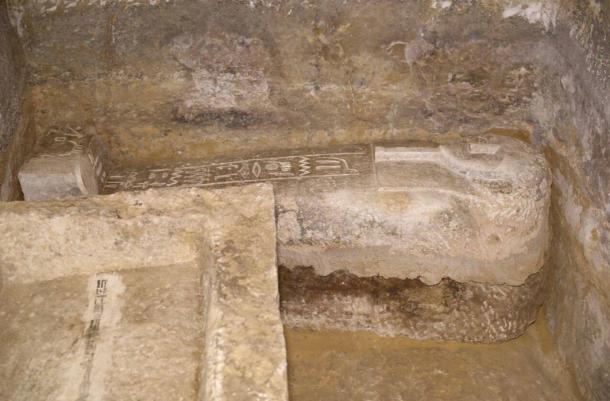 An engraved stone sarcophagus found in the burial chamber.