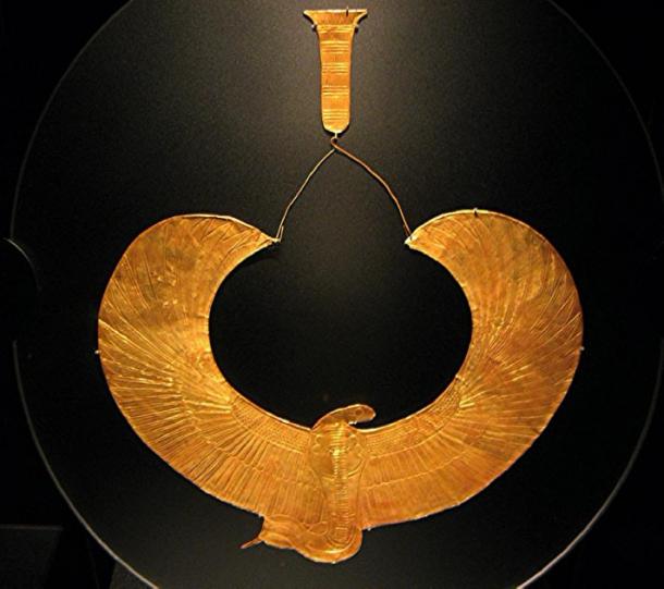 This engraved gold winged cobra amulet collar was one of several found on the thorax of King Tut's mummy, is in the form of Wadjet, the winged cobra goddess of Lower Egypt. (woodsboy2011 / CC BY-SA 2.0)