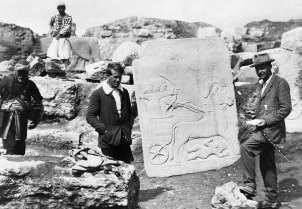 T E Lawrence with Leonard Woolley, the archaeological director, with a Hittite slab on the excavation site at Carchemish