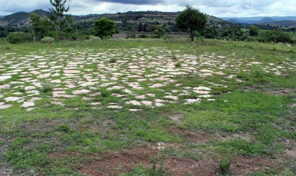 Excavations at Etlatongo in southern Mexico probed beneath surface remains of a Spanish hacienda’s threshing floor (shown) to reveal two ancient ball courts, built atop each other. (Formative Etlatongo Project)