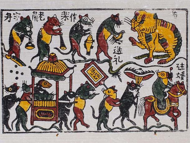 The famous Đám cưới chuột (Rat's wedding), a popular example of Đông Hồ painting of Vietnamese art. It features a wedding march of rats with the rat bride and groom and other rat guests delivering gifts to a big cat in hope that the cat will leave the happy couple alone. (Public Domain)