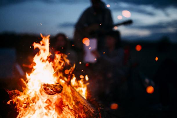 Christian group burns ‘satanic objects’ in bonfire. Credit: Andris / Adobe Stock