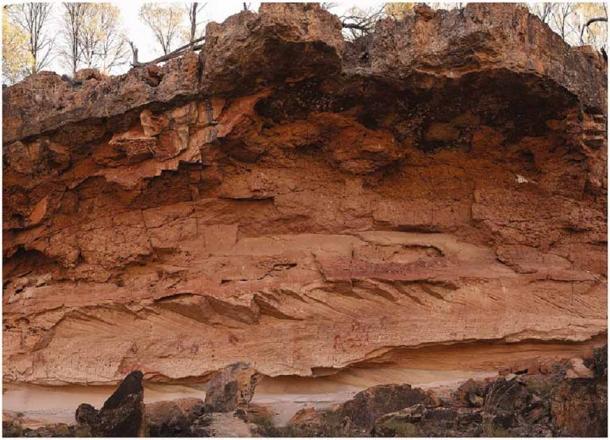 The central portion of the Australian rock shelter art at Marra Wonga, Queensland, with an extensive wall of petroglyphs and stencils.