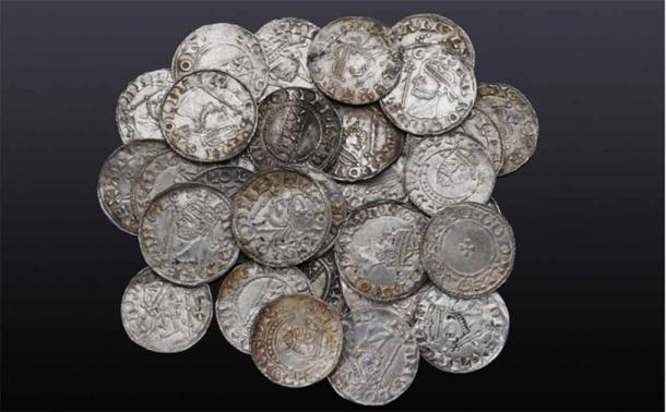 The Braintree hoard of 122 Anglo-Saxon pennies, found in Essex, England.      Source: Noonans