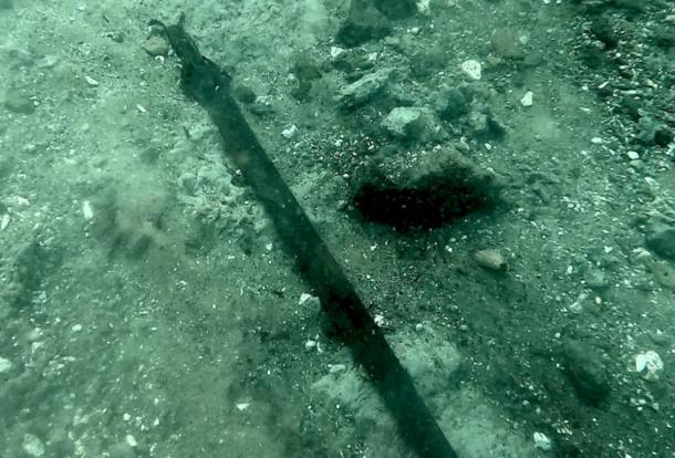 The 3,000-year-old bronze sword where it lay on the bed of Lake Mezzano